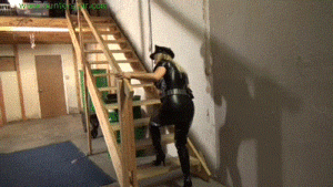 www.jimhunterslair.com - Busty blond cop locked in her own cuffs and made to suck his cock thumbnail