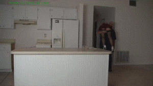 www.jimhunterslair.com - Bespectacled pixie coed left frogtied and helpless in her kitchen thumbnail