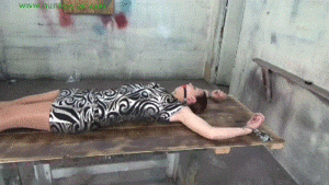 www.jimhunterslair.com - Helplessly cuffed to his table  thumbnail