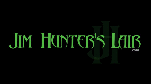 www.jimhunterslair.com - Busty redhead captive of the Hunter thumbnail