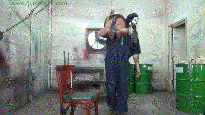 www.jimhunterslair.com - Chair tied, crotchroped with her big beautiful tits cuffed, pulled & stretched thumbnail